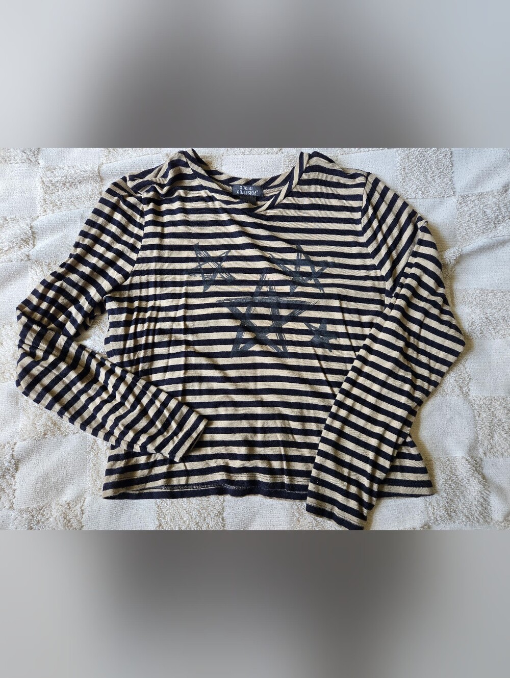 Social Collision Black and Cream Striped Long Sleeve Crop Top with Star Graphics
